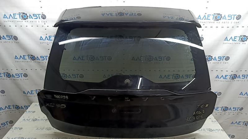 Дверь багажника голая со стеклом Volvo XC90 16-22 тонировка, черный 717, со спойлером, стоп-сигналом, трапецией дворника, треснут спойлер