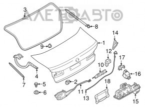 Butonul pentru deschiderea portbagajului unui BMW 5 G30 17-23 de sub cameră este uzat