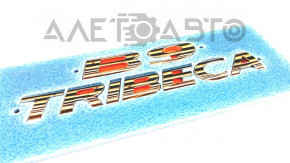 Emblema cu inscripția TRIBECA de pe portbagajul Subaru B9 Tribeca